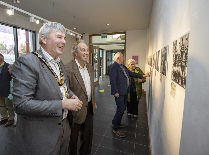 The Mayor of Causeway Coast and Glens Borough Council Councillor Richard Holmes pictured with local historian Nelson McGonagle at the opening of a new exhibition of his photographs at Roe Valley Arts and Cultural Centre