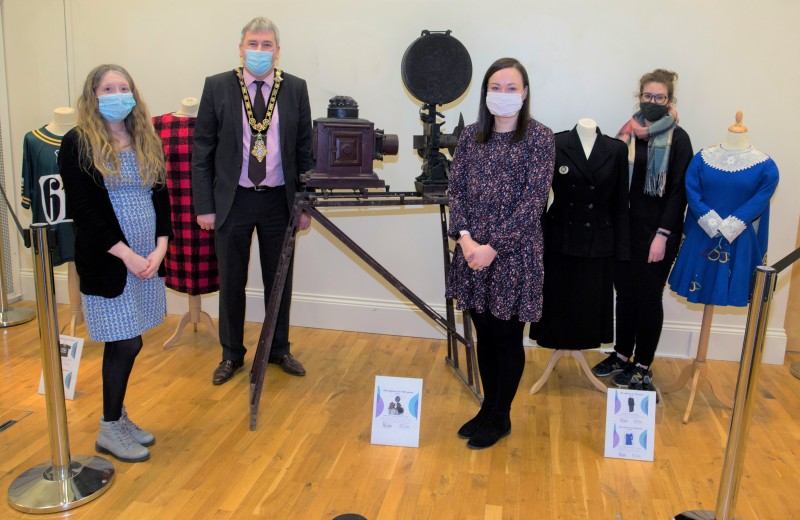 Rachel Archibald, Jamie Austin and Sarah Carson from Causeway Coast and Glens Borough Council’s Museums Service and the Mayor, Councillor Richard Holmes, with some of the items on display in the ‘100 Objects for 100 Years’ exhibition which is now open at Ballymoney Museum.