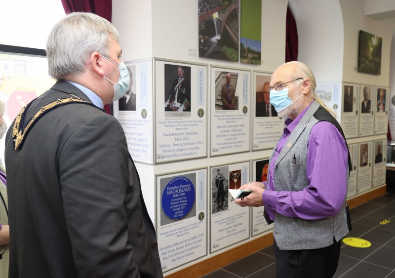 Matthew Ferguson from Roe Valley Ancestral Researchers talks to the Mayor of Causeway Coast and Glens Borough Council, Councillor Richard Holmes at the opening of the NI100 - Influencers from the Roe Valley’ exhibition at Roe Valley Arts and Cultural Centre.