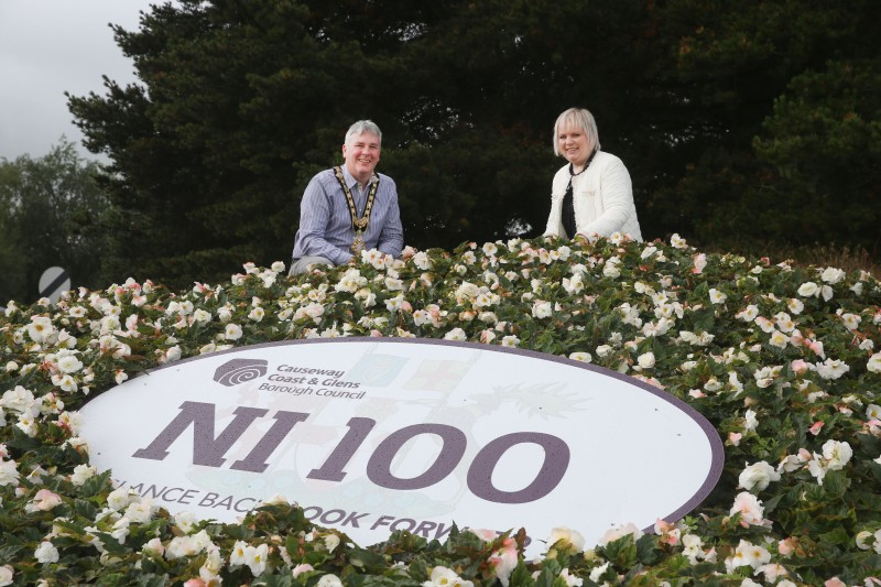 The Mayor of Causeway Coast and Glens Borough Council Councillor Richard Holmes and Councillor Michelle Knight McQuillan pictured at one of the NI 100 themed flowerbeds located near the Lodge Road roundabout in Coleraine.