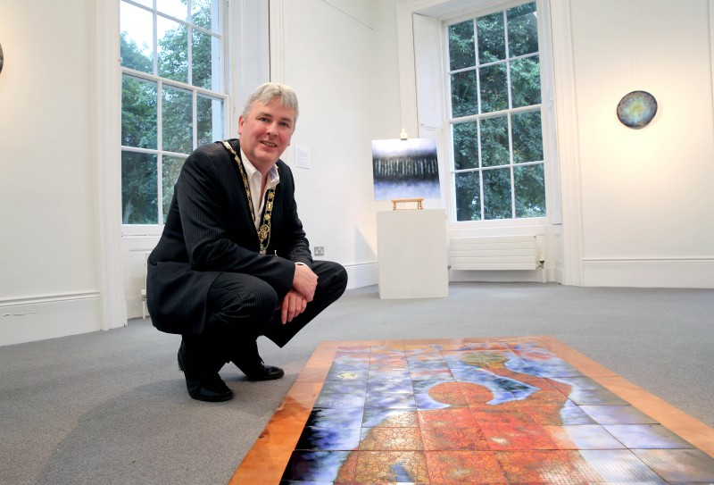 The Mayor of Causeway Coast and Glens Borough Council Councillor Richard Holmes pictured during his visit to Susan Mannion’s ‘Beyond Darkness’ exhibition at Flowerfield Arts Centre.