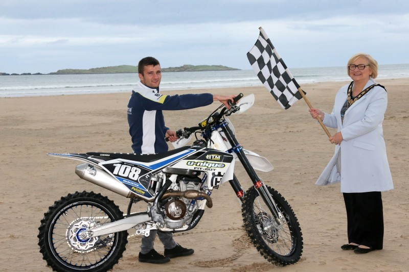 Ballymoney racer Michael McAlister pictured at East Strand with the Mayor of Causeway Coast and Glens Borough Council Councillor Brenda Chivers ahead of Portrush Beach Races which take place on October 27th and 28th.