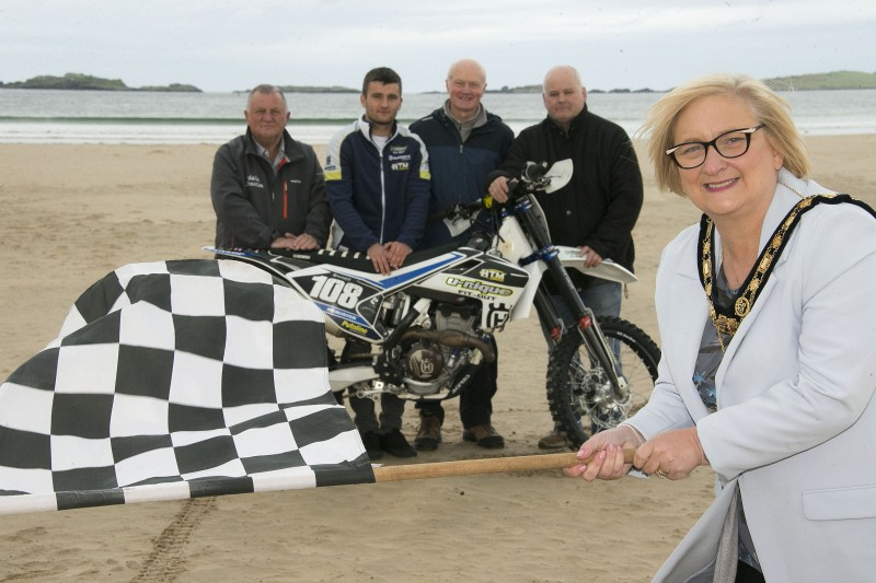 The Mayor of Causeway Coast and Glens Borough Council Councillor Brenda Chivers gets set for Portrush Beach Races which return on October 27th and 29th alongside Foyle District Motor Cycle Club representatives Eddie Johnston, Andrew Huston and Peter Bell with rider Michael McAlister.