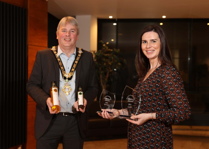 The Mayor of Causeway Coast and Glens Borough Council Councillor Richard Holmes pictured with Blas na hEireann winner Leona Kane from Broighter Gold.