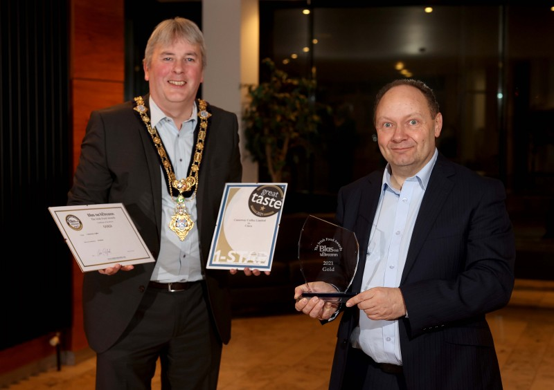The Mayor of Causeway Coast and Glens Borough Council Councillor Richard Holmes pictured with Great Taste Award and Blas na hÉireann winner Graham Watts from Causeway Coffee.