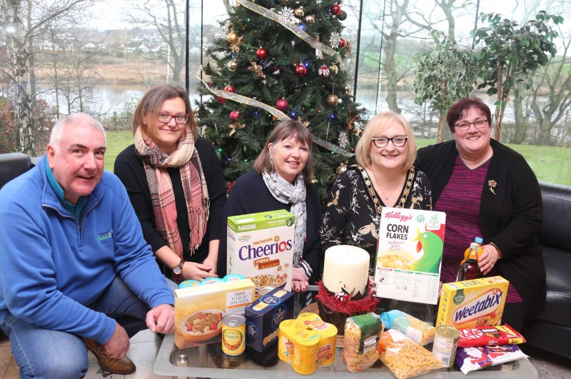 The Mayor of Causeway Coast and Glens Borough Council, Councillor Brenda Chivers pictured with Jarleth Hegarty, Ballymoney Foodbank, Melanie Gibson, Coleraine Foodbank, Eleanor Hayes, Ballycastle Foodbank and Hazel Brooks, Limavady Foodbank as they receive the food donated by Causeway Coast and Glens Borough Council’s November ‘Food Drive.’