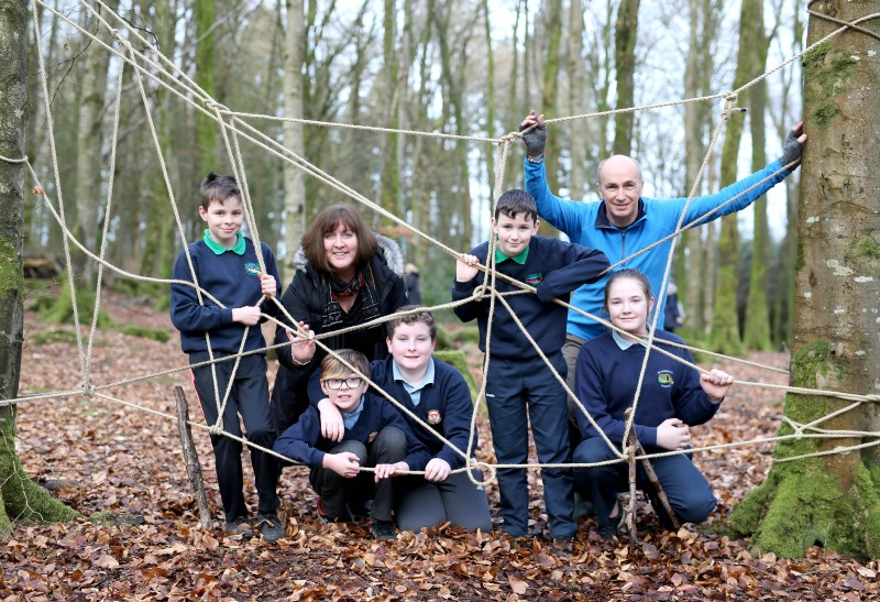 Pupils from St Patrick’s Primary School (Glenariff), Bushvalley Primary School (Stranocum) and St.Ciaran’s Primary School (Cushendun), who took part in the Shared Education visit to Garvagh Forest pictured with Good Relations Officer Joy Wisener and a volunteer from Garvagh Forest School.