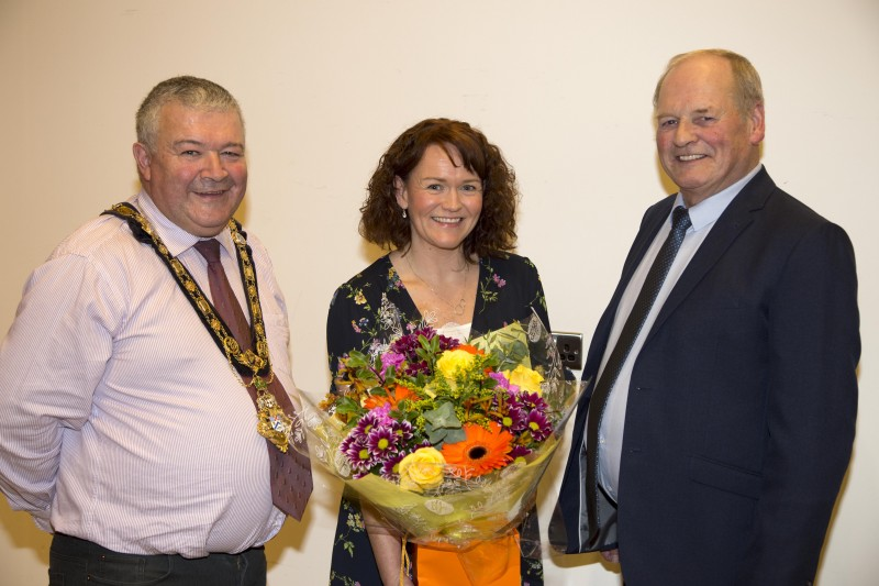 The Mayor of Causeway Coast and Glens Borough Council, Councillor Ivor Wallace, Lisa Bailey from Cancer Research and Garvagh District Cancer Research Committee Chairman Robert Glass.