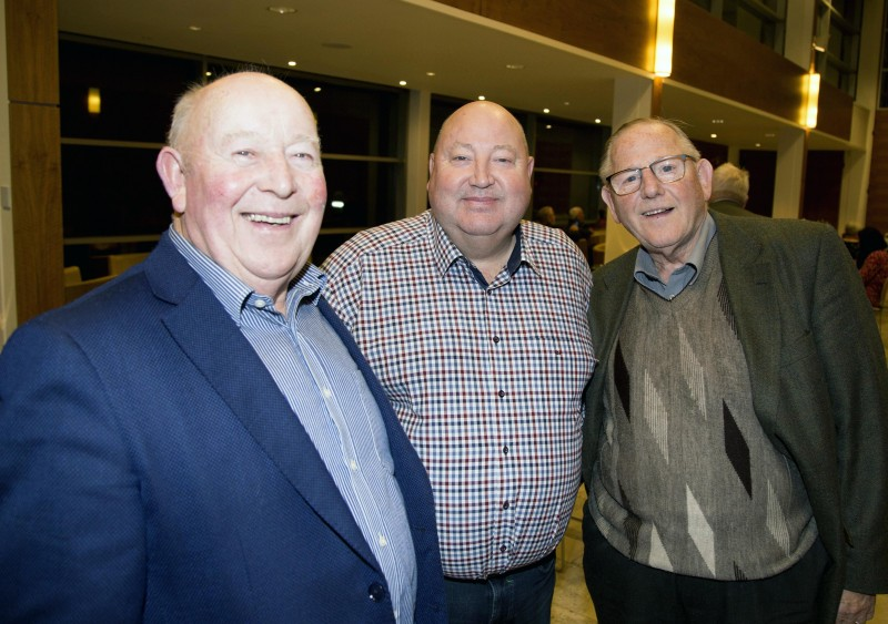 Robin McQuillan and Sammy Gordon pictured with Alderman Adrian McQuillan at the reception in Cloonavin to mark 60 years of Garvagh District Cancer Research Committee.