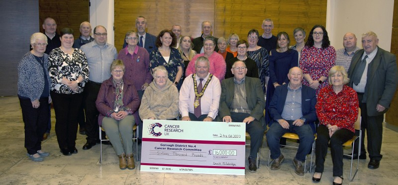Garvagh District Cancer Research Committee members pictured in Cloonavin where they presented a cheque for £16,000 to Lisa Bailey from the charity.