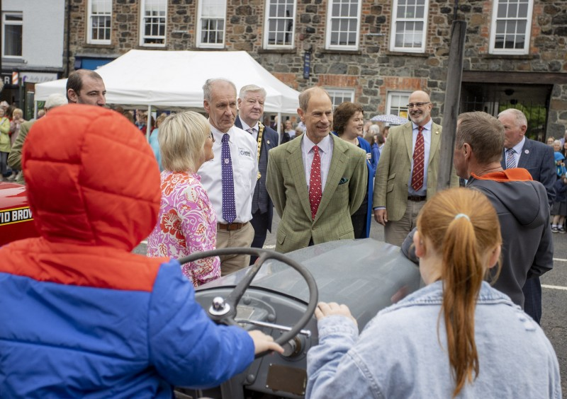The Duke of Edinburgh chats with representatives from the Clydesdale and Vintage Vehicle Club