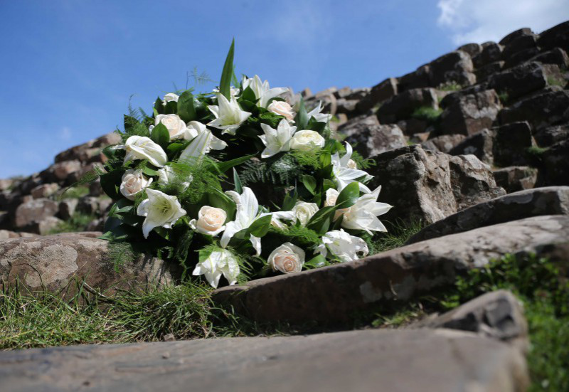 A wreath sits on the stones at the Giant's Causeway ahead of the service to remember those who perished when La Girona sank at Lacada Point in 1588.