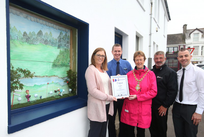 Cathal McTaggart (second left) from William Hill bookmakers in Portstewart receives the second place prize from Annette Deighan from Causeway Chamber of Commerce, the Mayor of Causeway Coast and Glens Borough Council Councillor Joan Baird OBE, Eddie Rowan, Tourism NI Events Manager. Also included is Bryan Brown from William Hill (right).