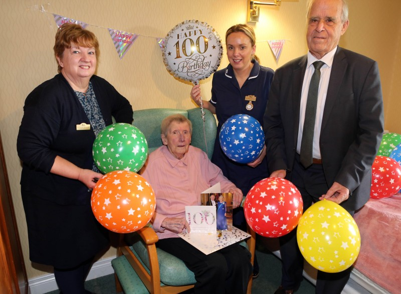 Gertrude Mullan celebrates turning 100 years old with staff members Patricia Deighin, Katrina Canning and Jarvis Nutt at Cornfields Care Centre.