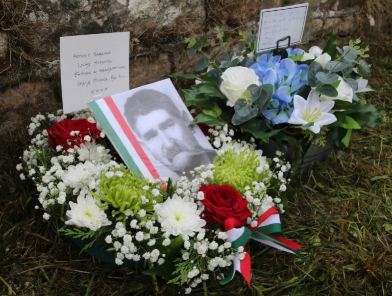 Flowers laid by the Nardone family mark the final resting of Antonio Nardone at Bonamargy Friary, outside Ballycastle.