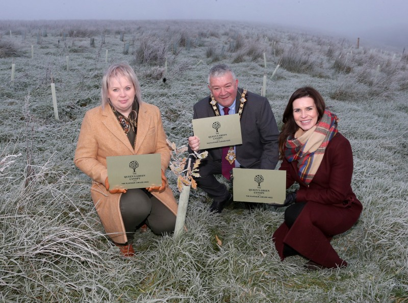 Alderman Michelle Knight McQuillan, Chair of Council’s Platinum Jubilee Working Group, the Mayor of Causeway Coast and Glens Borough Council, Councillor Ivor Wallace, and Leona Kane, Deputy Lieutenant of County Londonderry, pictured at Letterloan where thousands of new trees have been planted as part of the Queen’s Green Canopy.