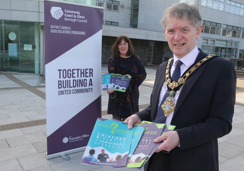 The Mayor of Causeway Coast and Glens Borough Council Alderman Mark Fielding pictured at Cloonavin with Good Relations Officer Joy Wisener to mark the launch of the new ‘Hide or Seek?’ resource which is now available for post-primary schools.
