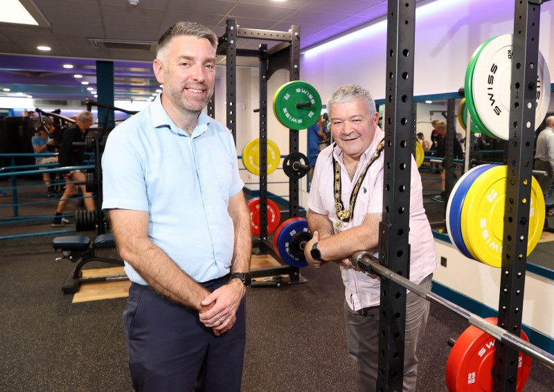Glen Rankin, Leisure Operations Manager, welcomes the Mayor of Causeway Coast and Glens Borough Council, Councillor Ivor Wallace, to the newly refurbished Fitness Suite in Coleraine Leisure Centre.