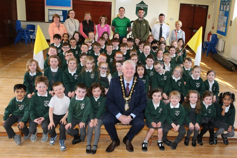 The Mayor, Councillor Steven Callaghan, joins the children of St. Patricks Primary School Portrush coaching staff and teachers as the teams played in the All-Ireland Olympic handball Finals last month.