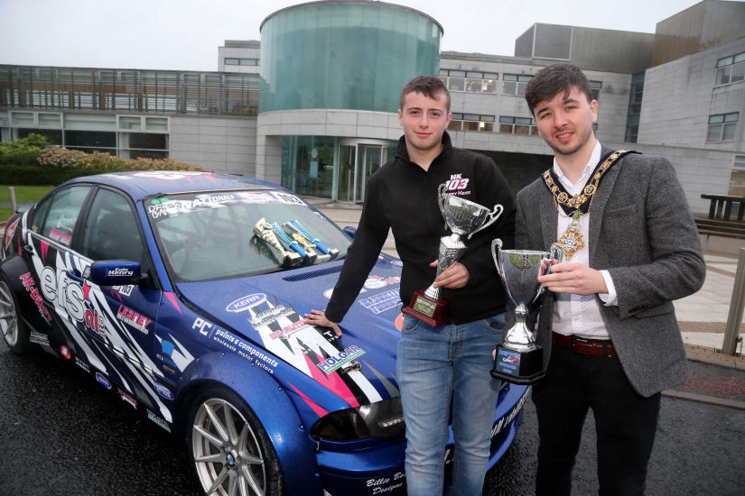 The Mayor of Causeway Coast and Glens Borough Council Councillor Sean Bateson pictured with drift car racing star Harry Kerr.