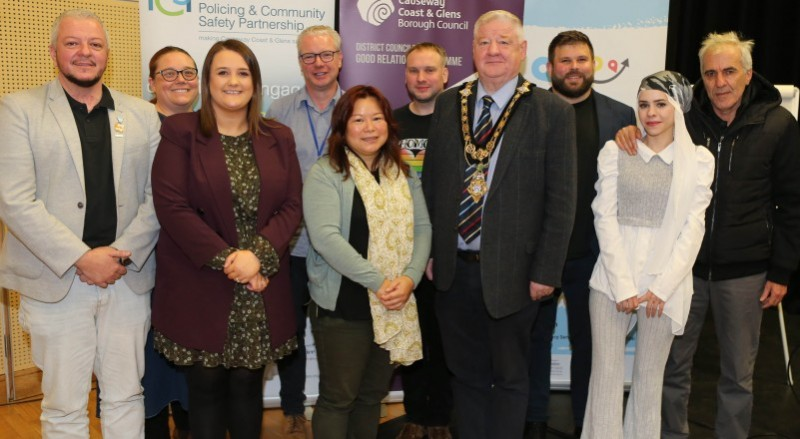 Storytellers and representatives from the Hate Crime Advocacy Service pictured alongside the Mayor, Cllr Steven Callaghan.