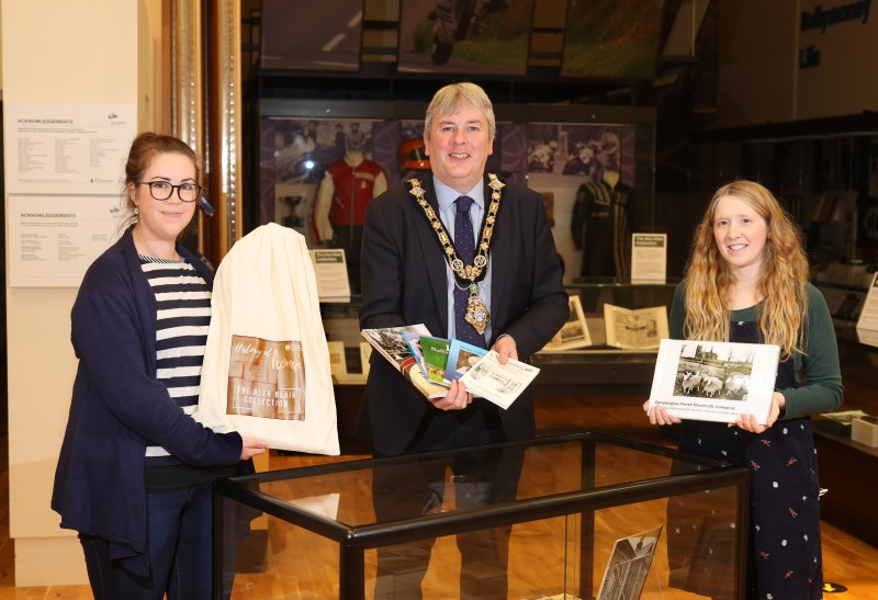 The Mayor of Causeway Coast and Glens Borough Council Councillor Richard Holmes pictured with Museum Services Officers Sarah Carson and Jamie Austin as they launch the new History at Home initiative.