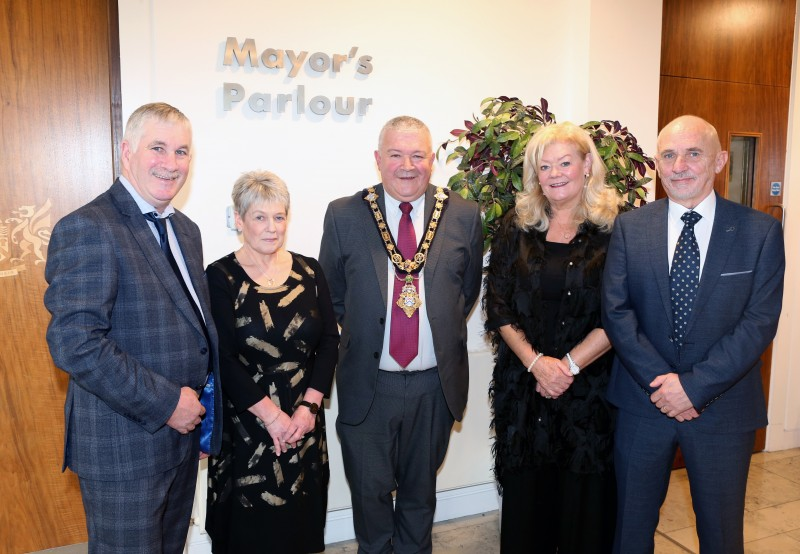 The Mayor of Causeway Coast and Glens Borough Council, Councillor Ivor Wallace, pictured with Victor Chestnutt OBE from Bushmills and his wife Caron, along with Joe Breen OBE and his wife Anne from Ballycastle.