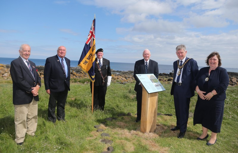 Joe O’Connor, Ron Galbraith, Tommy Henry, Harry Cullen and the Mayor of Causeway Coast and Glens Borough Council and Mayoress, Mrs Phyllis Fielding, pictured at the unveiling of the new information panel at the site of the World War II arrow between Portrush and Portstewart.