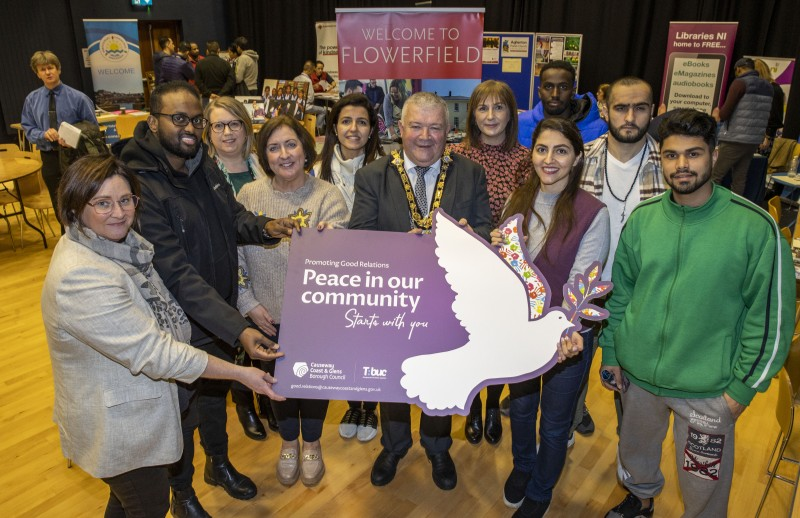 The Mayor of Causeway Coast and Glens Borough Council, Councillor Ivor Wallace, pictured with some of those who participated in the information event, including Agherton Parish Church, Council staff, and peacebuilding organisation Beyond Skin.