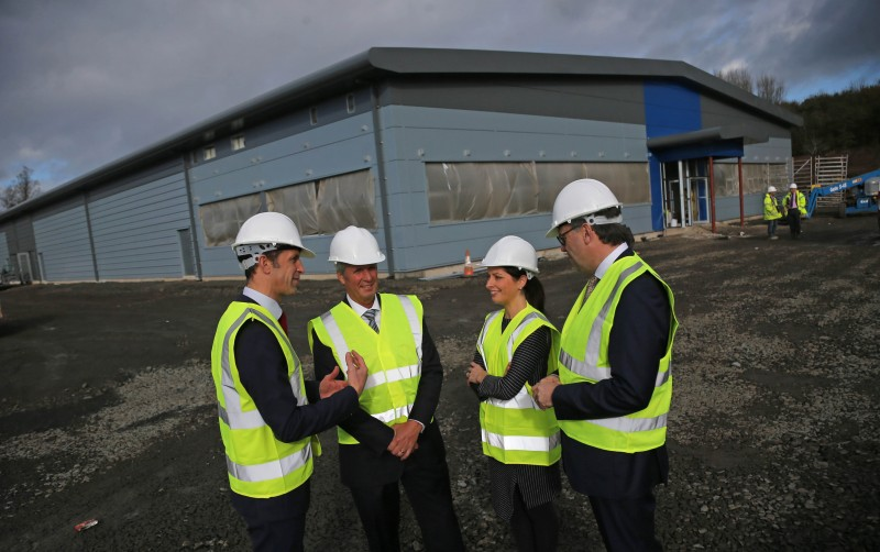 Richard Baker, Causeway Coast and Glens Borough Council's Director of Leisure and Development speaks with Invest NI Chief Executive Alastair Hamilton, Chairman Mark Ennis and Ulster University Provost Karise Hutchinson during a tour of the Atlantic Link Enterprise Campus.