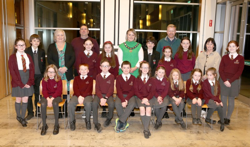 Councillor Kathleen McGurk, Deputy Mayor of Causeway Coast and Glens Borough Council, pictured with some of those who attended the Irish Language Week event from Gaelscoil Léim An Mhadaidh, Gaelcholáiste Dhoire in Dungiven and Irish cultural group, Glór Limavady.