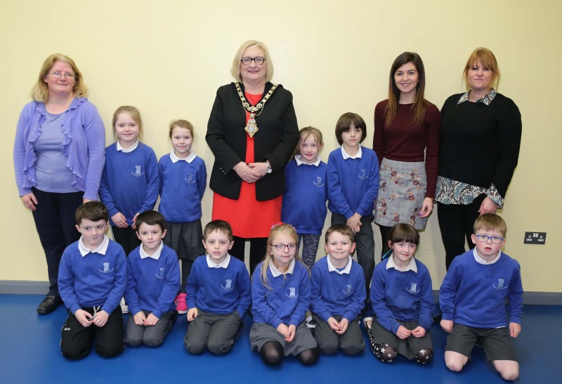 The Mayor of Causeway Coast and Glens Borough Council Councillor Brenda Chivers pictured with pupils and staff members during her visit to Gaelscoil an Chaistil in Ballycastle.