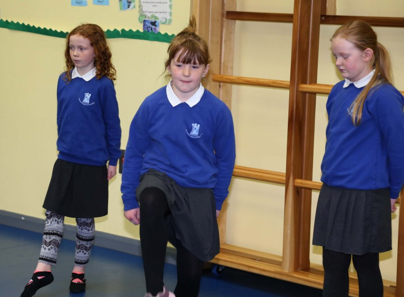 Dancers take to the floor during the visit of the Mayor of Causeway Coast and Glens Borough Council Councillor Brenda Chivers to Gaelscoil an Chaistil in Ballycastle.
