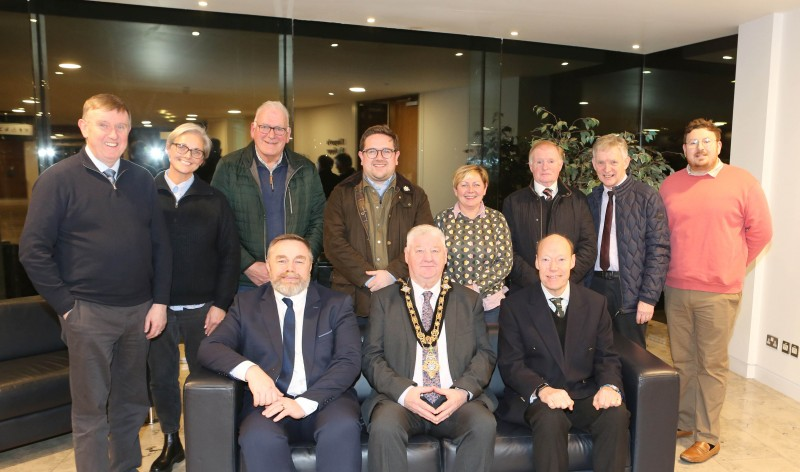 Mayor of Causeway Coast and Glens, Councillor Steven Callaghan pictured with incoming CEO of The Honourable The Irish Society, Duane Farrell and outgoing CEO, Edward Montgomery. Also pictured (back row L-R) are Cllr Mervyn Storey, Cllr Tanya Stirling, Cllr Bill Kennedy, Alderman Aaron Callan, Ald Sharon McKillop, Cllr Russell Watton, Ald Mark Fielding, Ald Richard Stewart.