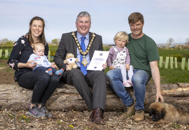 The Mayor of Causeway Coast and Glens Borough Council Councillor Richard Holmes pictured with Hannah and Kyle McAuley, and their children Albert and Harper. Albert, who was born on February 6th 2022, 70 years after HM The Queen’s accession, was presented with a special Jubilee teddy bear and certificate to mark this special date.