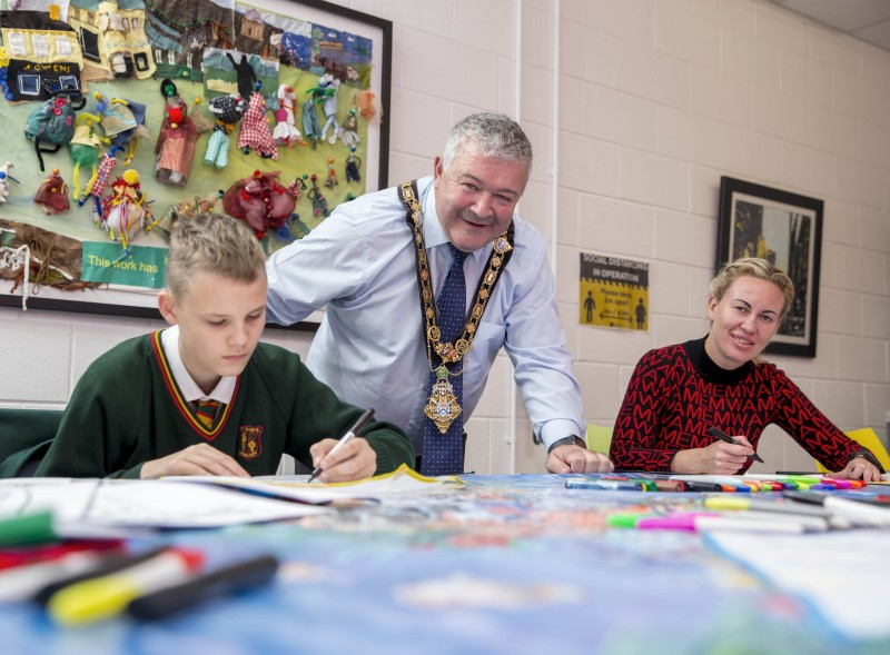 The Mayor of Causeway Coast and Glens Borough Council, Councillor Ivor Wallace, pictured with participants at the kite-making workshop held during Good Relations Week in Limavady.