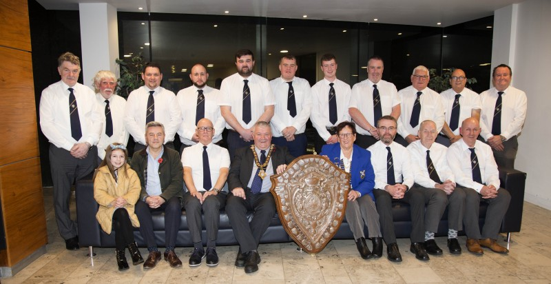 Bowling team members from Limavady, who recently won the NIPBA Premier League for the first time in the club’s 110-year-history, pictured in Cloonavin with the Mayor of Causeway Coast and Glens Borough Council, Councillor Ivor Wallace, and Alan Robinson MLA.