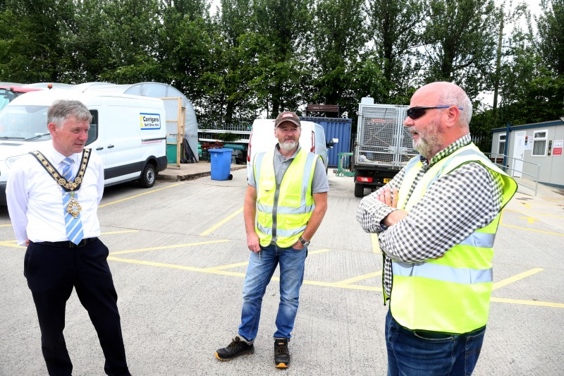 The Mayor of Causeway Coast and Glens Borough Council Alderman Mark Fielding pictured at Limavady depot with Stephen Proctor and Martin McNicholl.