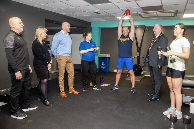 Mayor of Causeway Coast and Glens, Councillor Steven Callaghan is shown some of the new equipment in the HIIT Room by fitness instructors Annie Docerty and Simon Pimblet.