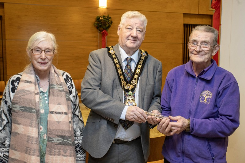 Mayor of Causeway Coast and Glens Borough Council, Councillor Steven Callaghan pictured with Betty Robinson and Joe Doherty of Roe Valley Ancestral Researchers.