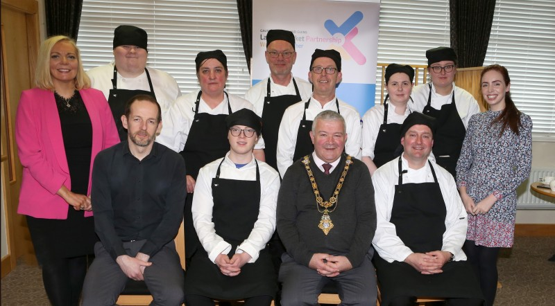 Mayor of Causeway Coast and Glens, Councillor Ivor Wallace with participants who completed the Causeway Coast and Glens Labour Market Partnership’s (LMP’s) inaugural Chef Academy.