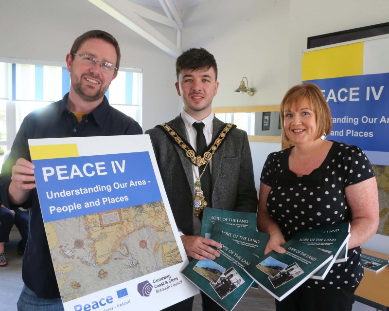 The Mayor of Causeway Coast and Glens Borough Council Councillor Sean Bateson pictured at the launch of the ‘Lore of the Land’ book with Dr Nicholas Wright from Causeway Coast and Glens Borough Council Museum Services and Roisin O’Neill.