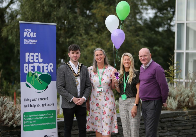 The Mayor of Causeway Coast and Glens Borough Council, Councillor Sean Bateson pictured with Alexandra McMeekin, Macmillan Services Project Manager, Catherine Bell-Allen, Move More Co-ordinator and Damian McAfee, Sport and Wellbeing Development Manager, Causeway Coast and Glens Borough Council at a ‘World’s Biggest Coffee Morning’ in Cloonavin to help launch the Move More project to the area.