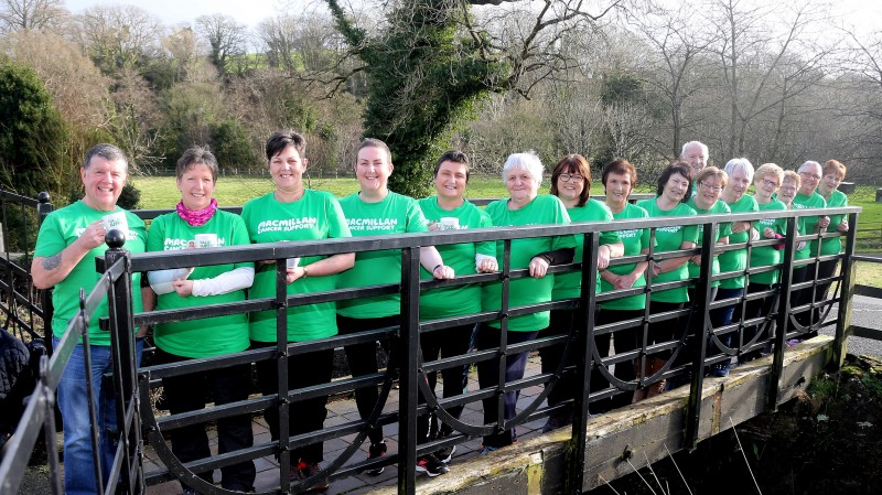 Participants show their support for Macmillan Cancer Support ahead of the fundraising walk on World Cancer Day.