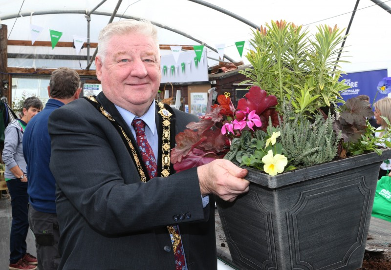 Mayor of Causeway Coast and Glens, Councillor Steven Callaghan shows of the planter he made at the ‘Feel-Good Gardening’ project. Cllr Callaghan has donated this to the Christmas Macmillan fundraising sale.