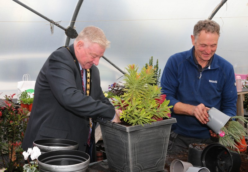 Mayor of Causeway Coast and Glens, Councillor Steven Callaghan is shown some tricks of the ‘gardening’ trade by Andrew McClarty.