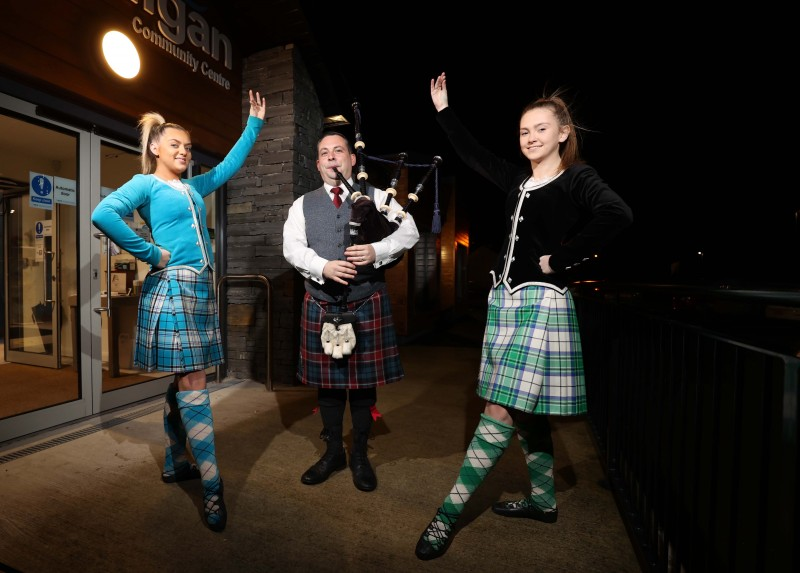 Piper Darren Milligan pictured with Megan Henderson and Emily Peart from the Sollus School of Highland Dance who performed at the musical evening held in Magilligan Community Centre.