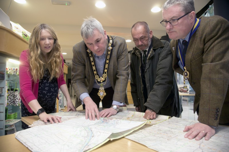 The Mayor of Causeway Coast and Glens Borough Council, Councillor Richard Holmes, views the Iraq war map collection, donated by local man Colour Sergeant Stephen Murdock (right). Also pictured are Museum Services Officer, Jamie Austin (far left) and Mark McLaughlin, Chairman, Royal British Legion, Ballymoney (far right).