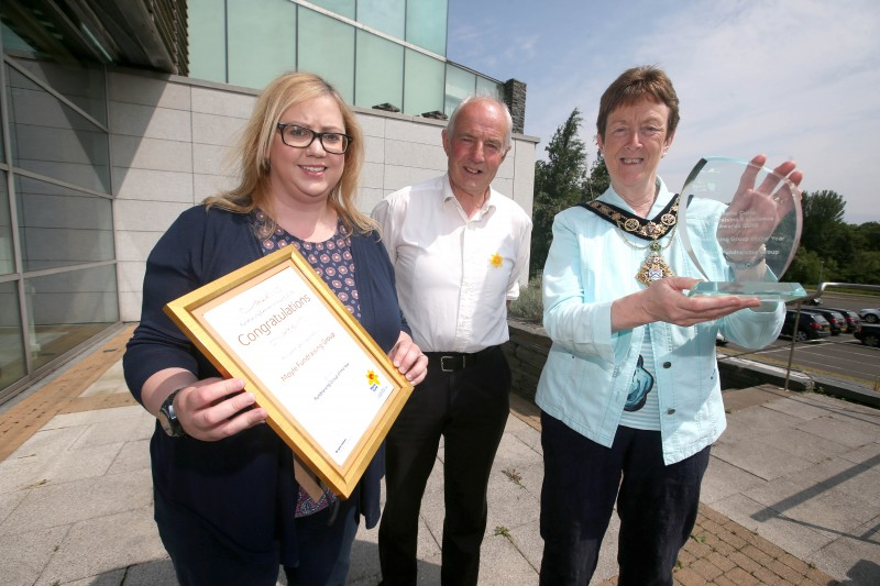 Heather Miller from Marie Curie pictured with the Mayor of Causeway Coast and Glens Borough Council Councillor Joan Baird OBE and Martin Gillen with the Excellence Award presented to Marie Curie Moyle as Fundraising Group of the Year.