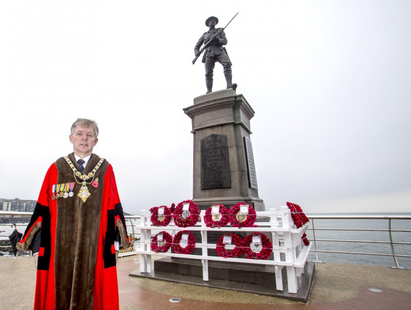 Mayor of Causeway Coast and Glens Borough Council, Alderman Mark Fielding pictured at Portstewart War Memorial on Remembrance Sunday ​